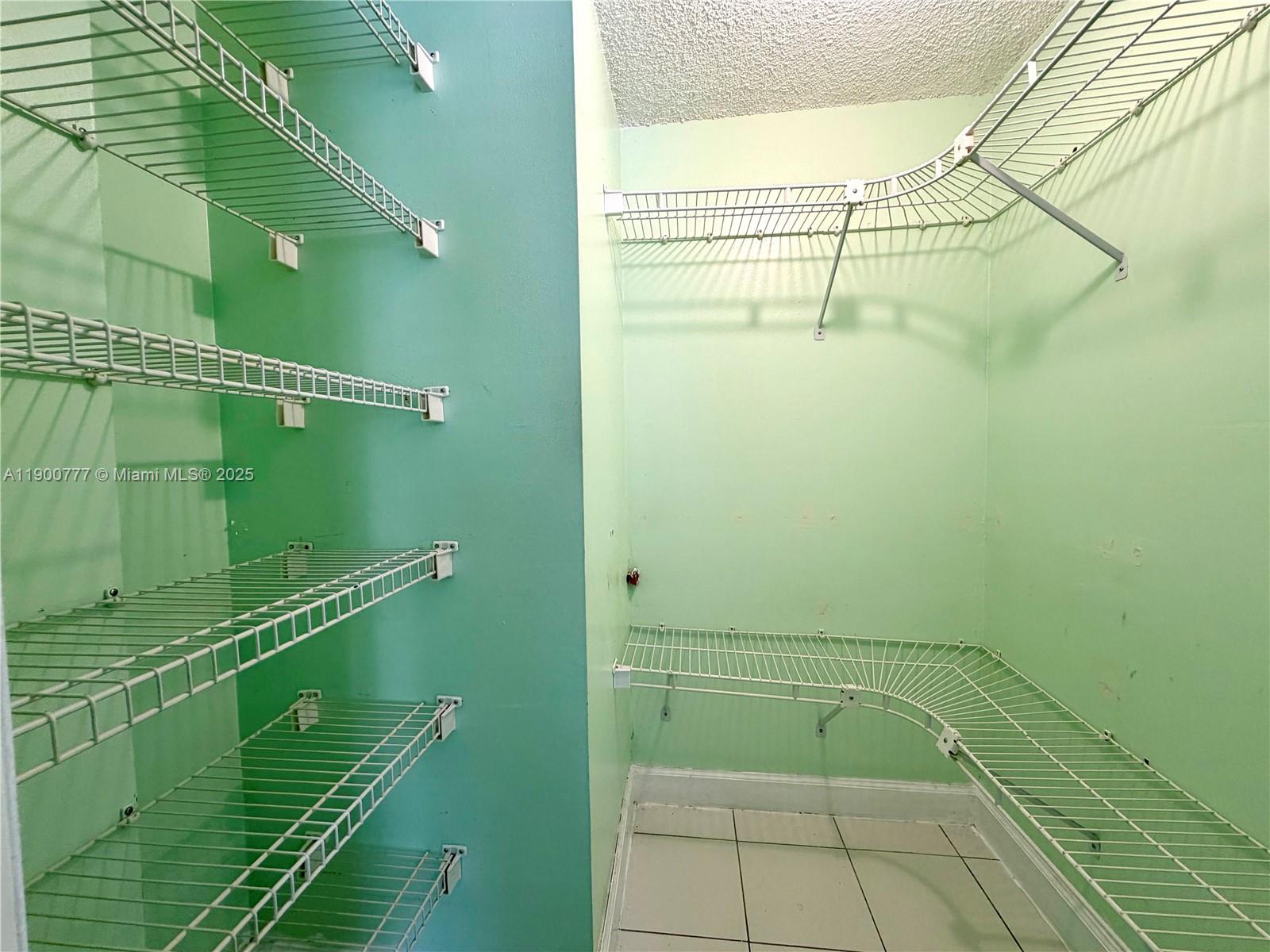 5201 Northwest 7th Street, Unit 212 Miami, FL 33126 - Photo 31 of 34 a bathroom with a shower