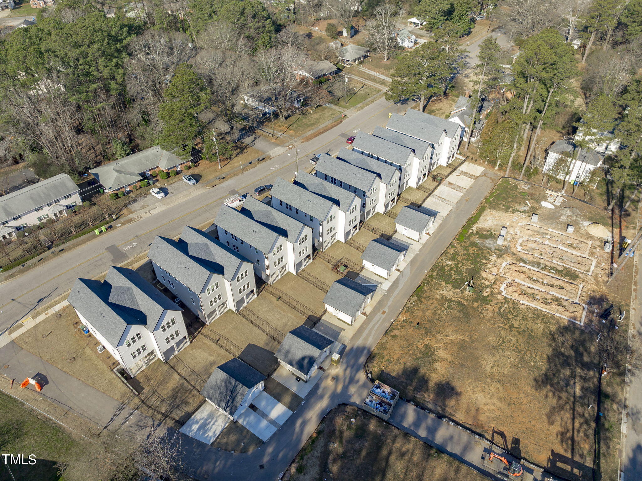901 Athens Drive, Unit 101 Raleigh, NC 27606 - Photo 51 of 62 an aerial view of residential houses with outdoor space