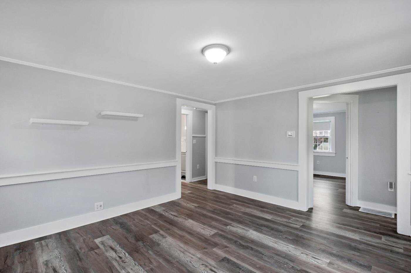 1 Gilbert Road Dennis Port, MA 02639 - Photo 9 of 27 a view of an empty room with wooden floor and closet