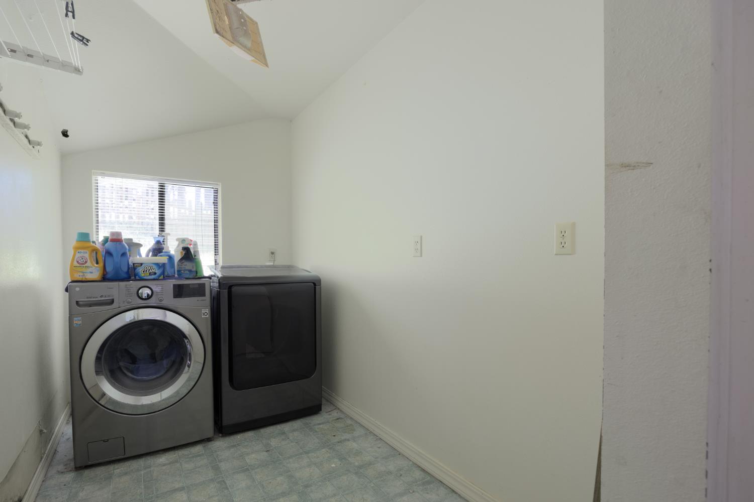 2070 King Of The Mountain Road Pollock Pines, CA 95726 - Photo 19 of 53 a utility room with dryer and washer