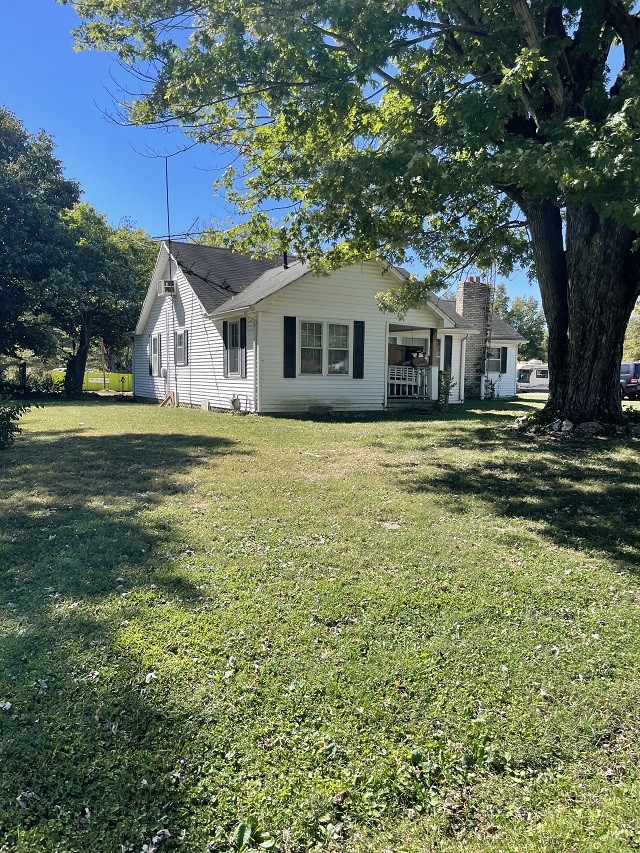 902 Days Road Lafayette, TN 37083 - Photo 24 of 65 a front view of a house with a garden