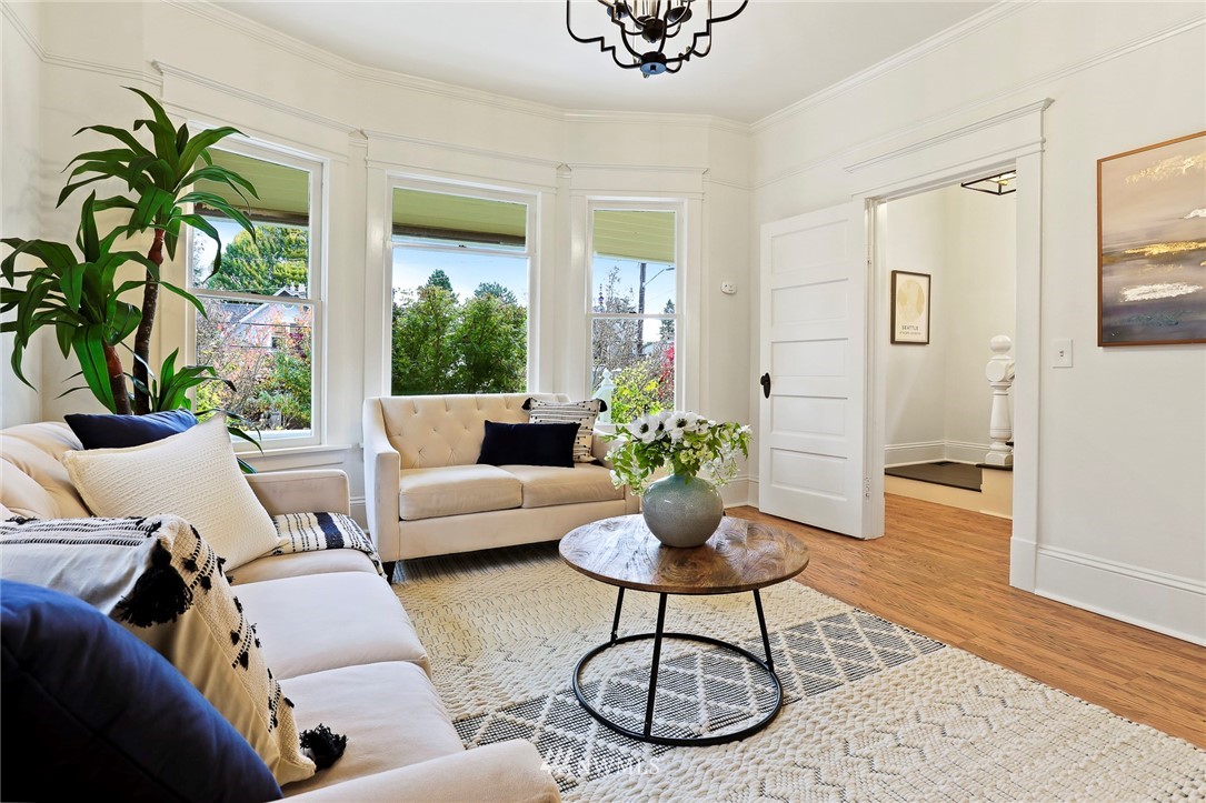 736 North 76th Street Seattle, WA 98103 - Photo 8 of 40 a living room with furniture potted plant and wooden floor