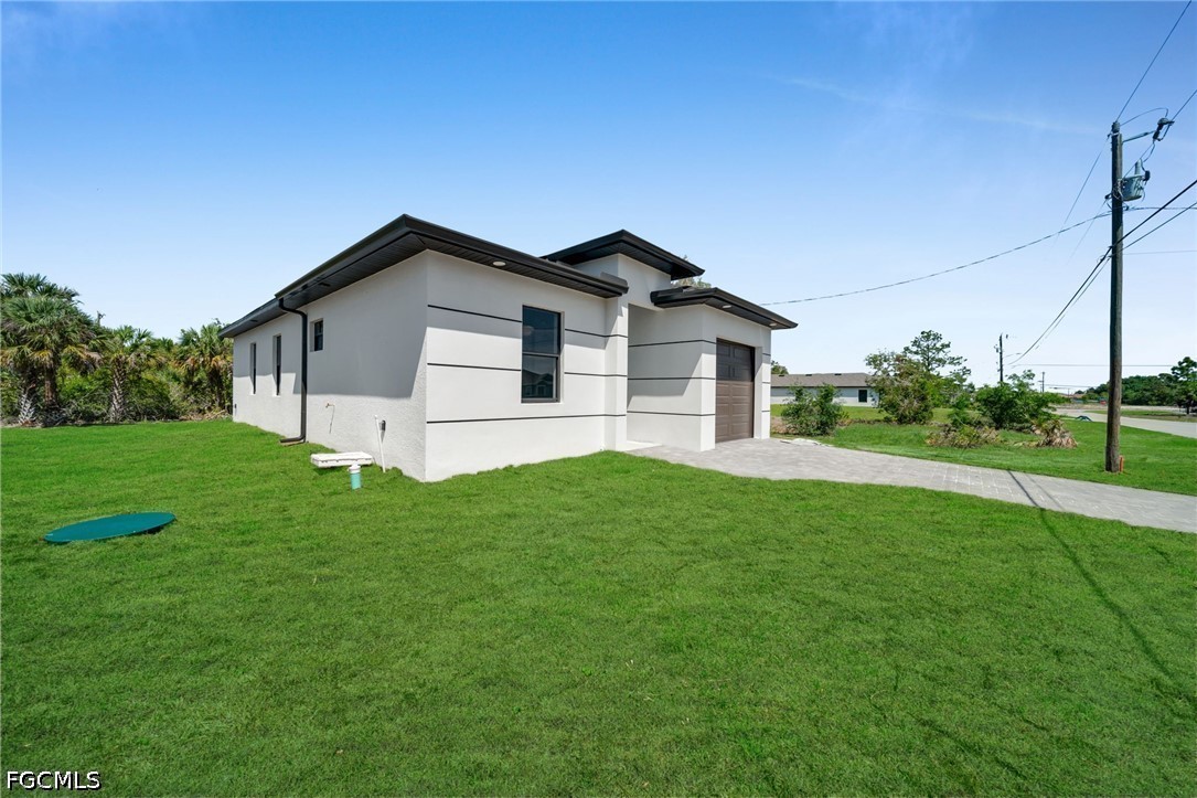 730 Goldrock Road Lehigh Acres, FL 33974 - Photo 3 of 28 Gallery Image 3