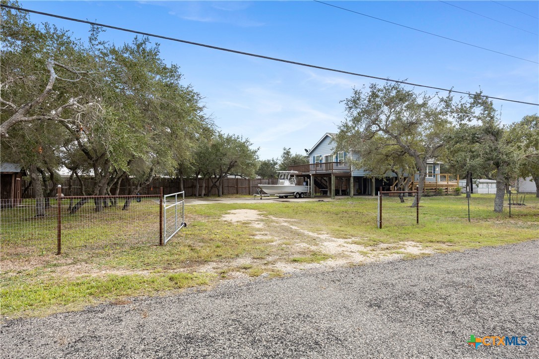 118 South Walker Road Aransas Pass, TX 78336 - Photo 19 of 20 a view of a house with a backyard