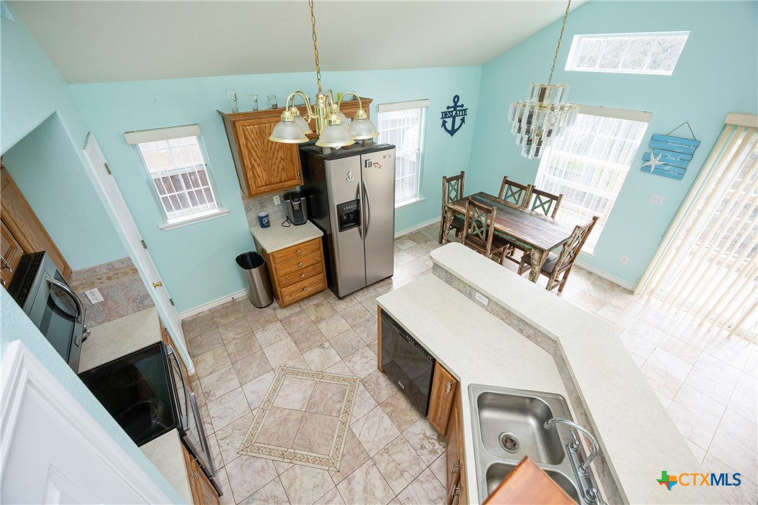 118 South Walker Road Aransas Pass, TX 78336 - Photo 10 of 20 a living room with furniture and a fireplace