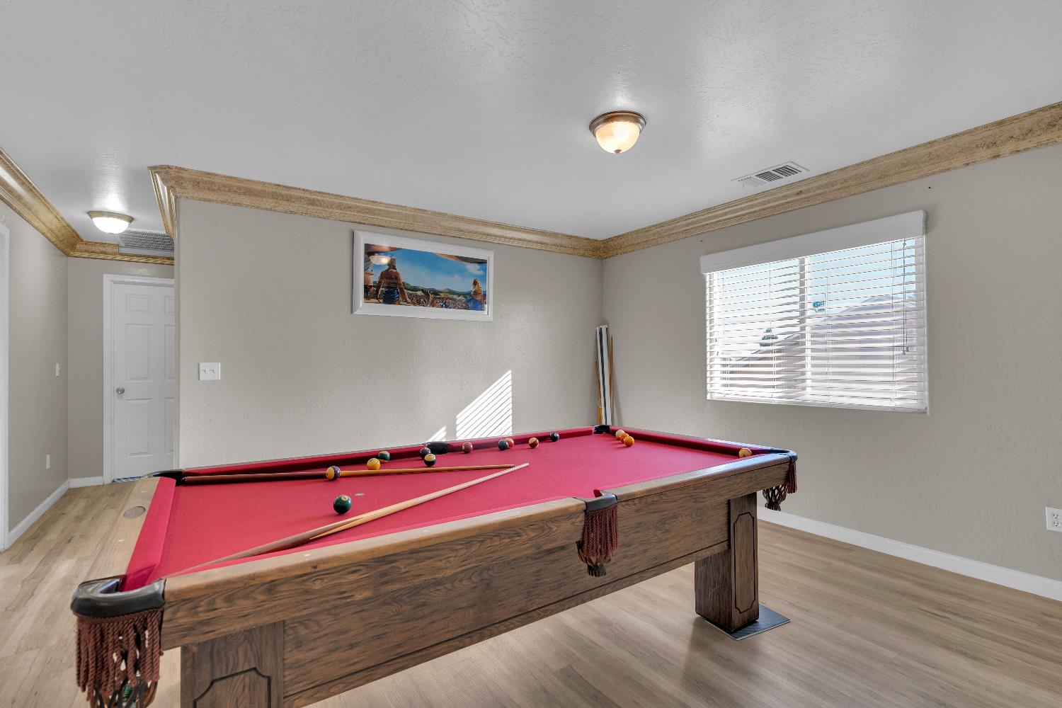 4729 North Rumi Avenue Fresno, CA 93723 - Photo 25 of 35 a bedroom with a bed and window
