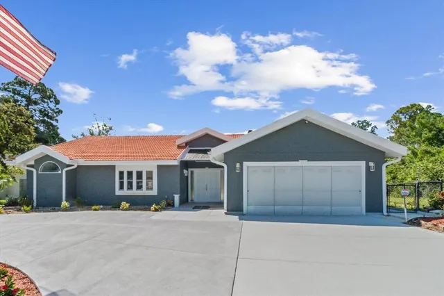 front view of a house with a street