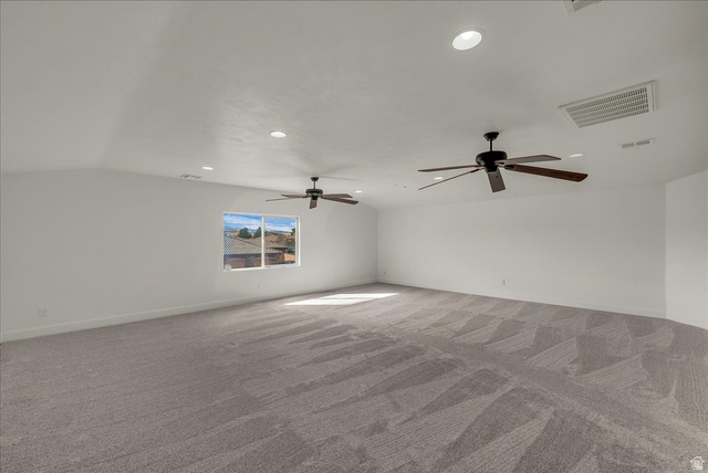 691 Rainier Drive St. George, UT 84770 - Photo 13 of 24 Unfurnished room featuring carpet, recessed lighting, a ceiling fan, and lofted ceiling