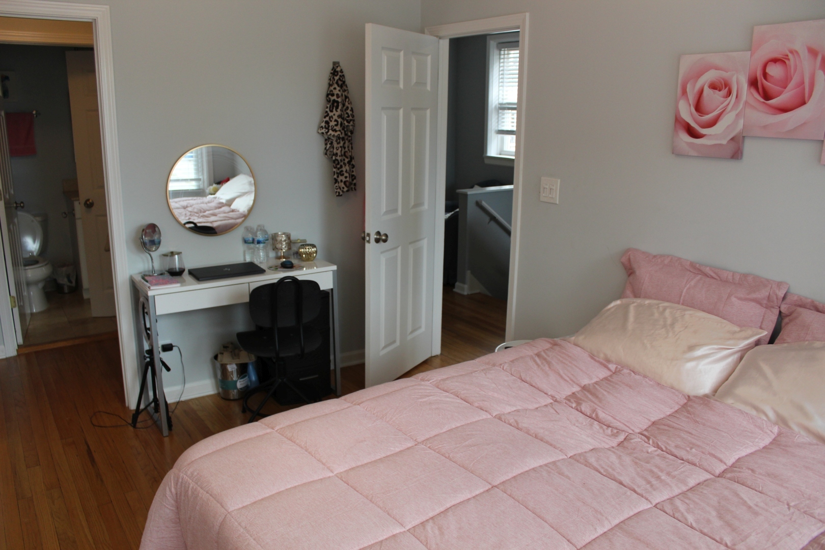 3745 West Argyle Street, Unit 1 Chicago, IL 60625 - Photo 14 of 35 a bedroom with a bed and a chandelier