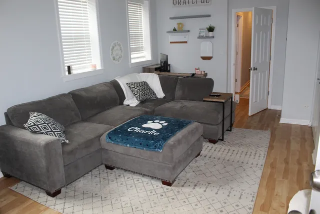 a living room with furniture and a couch