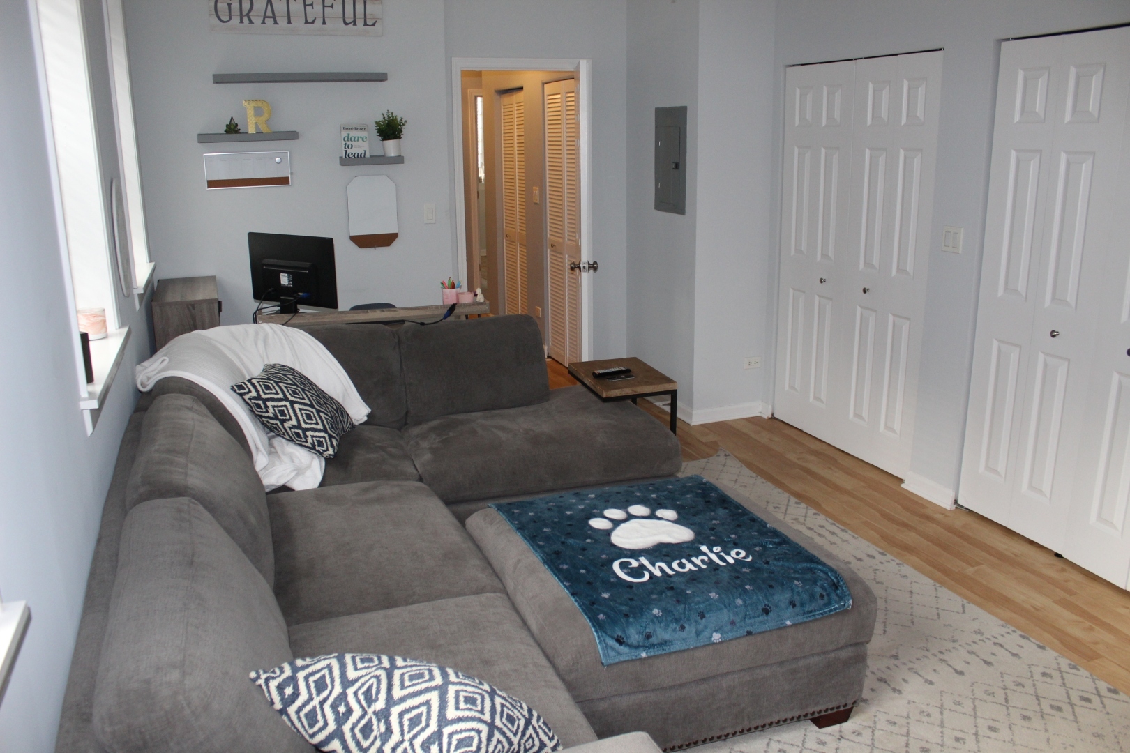 3745 West Argyle Street, Unit 1 Chicago, IL 60625 - Photo 22 of 35 a living room with a couch and a fireplace