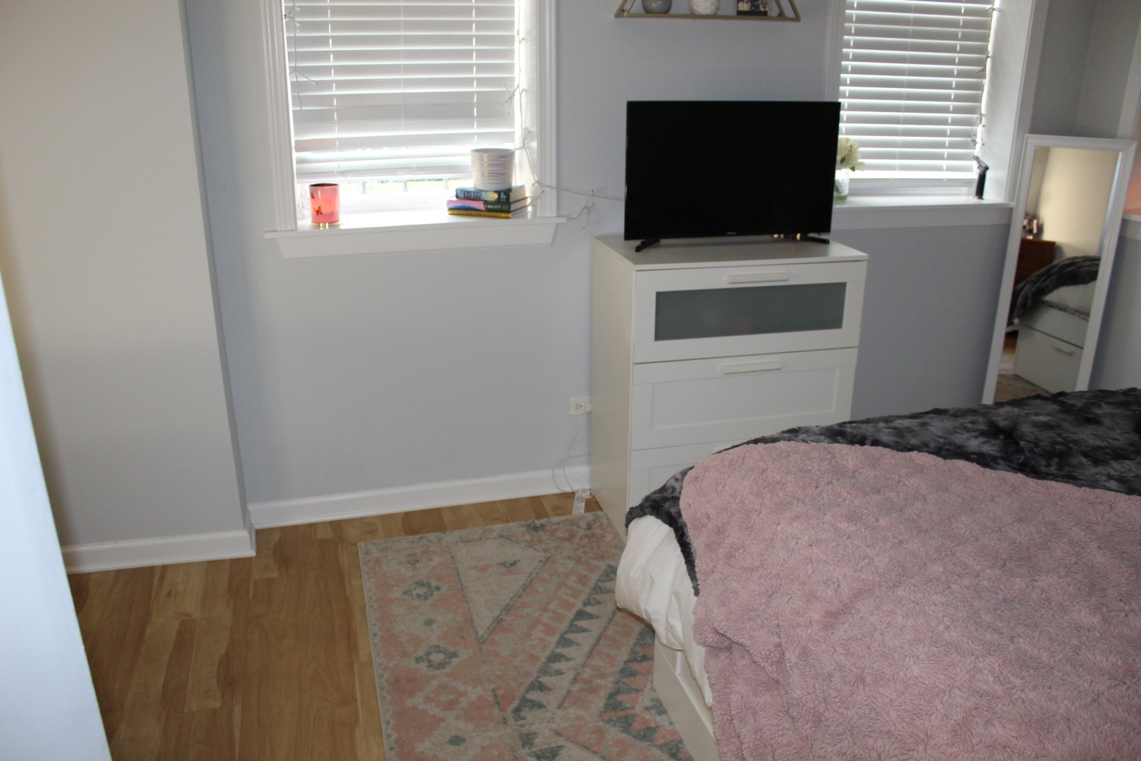 3745 West Argyle Street, Unit 1 Chicago, IL 60625 - Photo 28 of 35 a bedroom with a bed and a flat screen tv