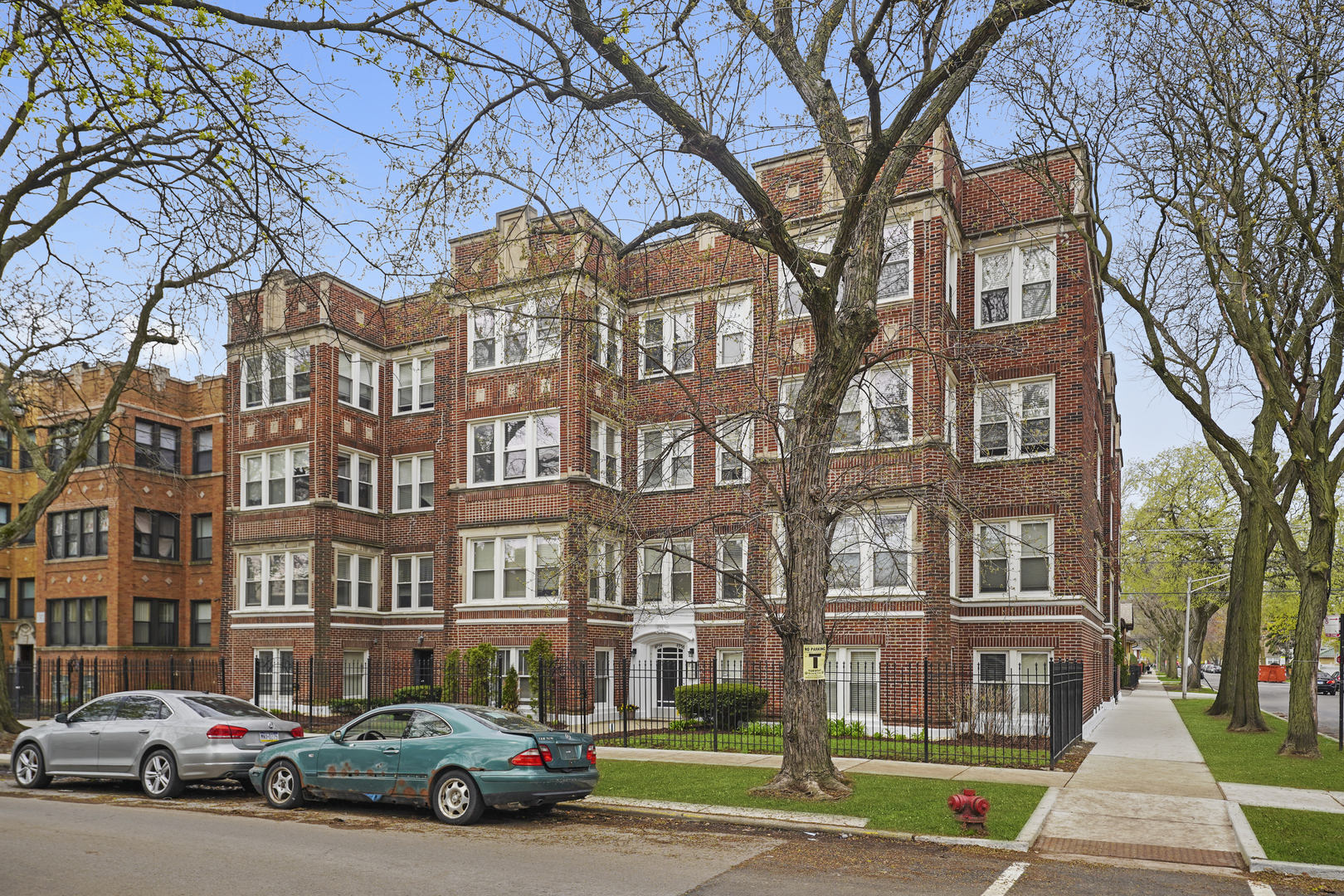 3745 West Argyle Street, Unit 1 Chicago, IL 60625 - Photo 35 of 35 a car parked in front of a brick building