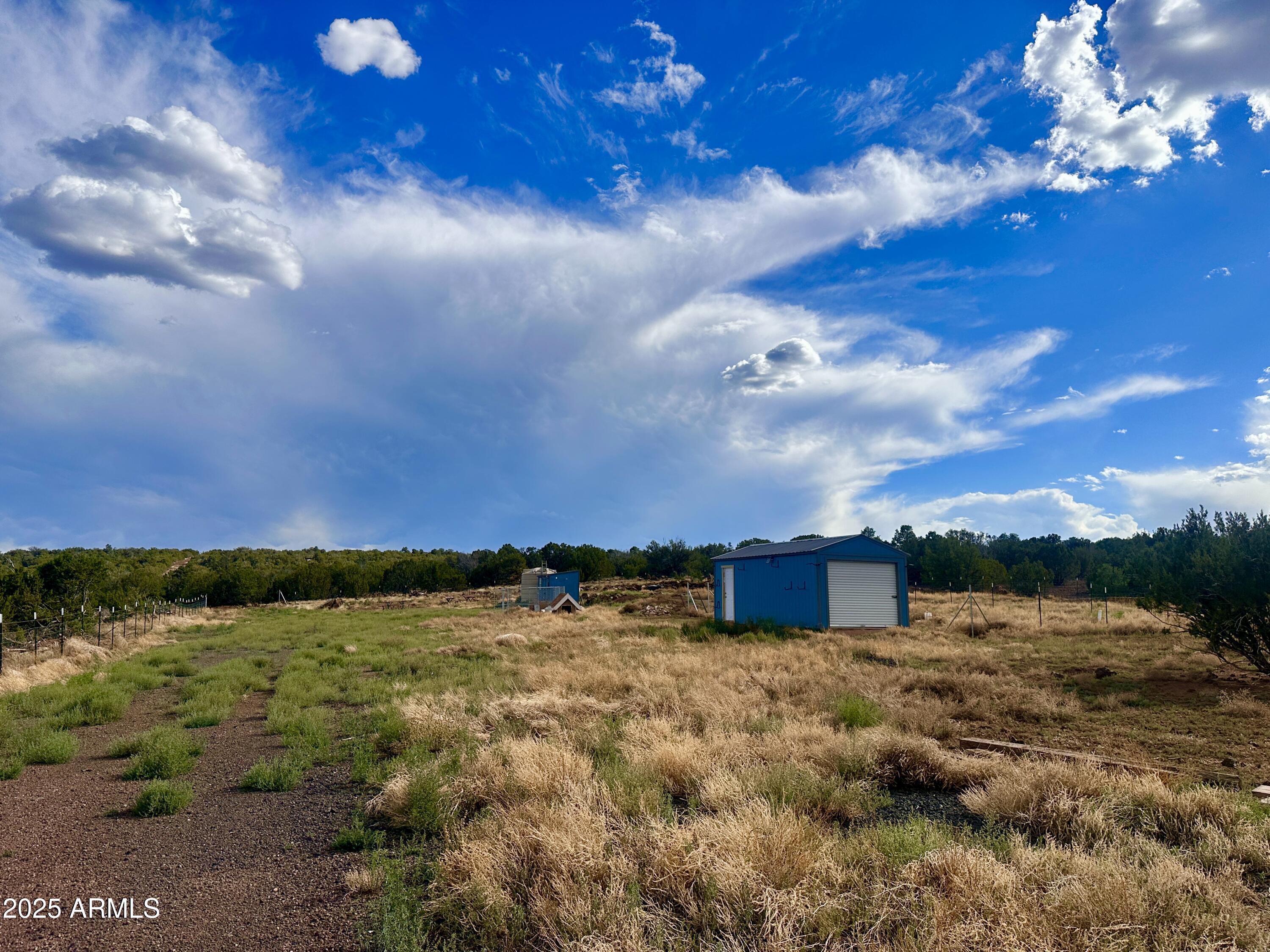 71 North 8225th, Unit 202 Show Low, AZ 85901 - Photo 13 of 13 a view of a building with sky view