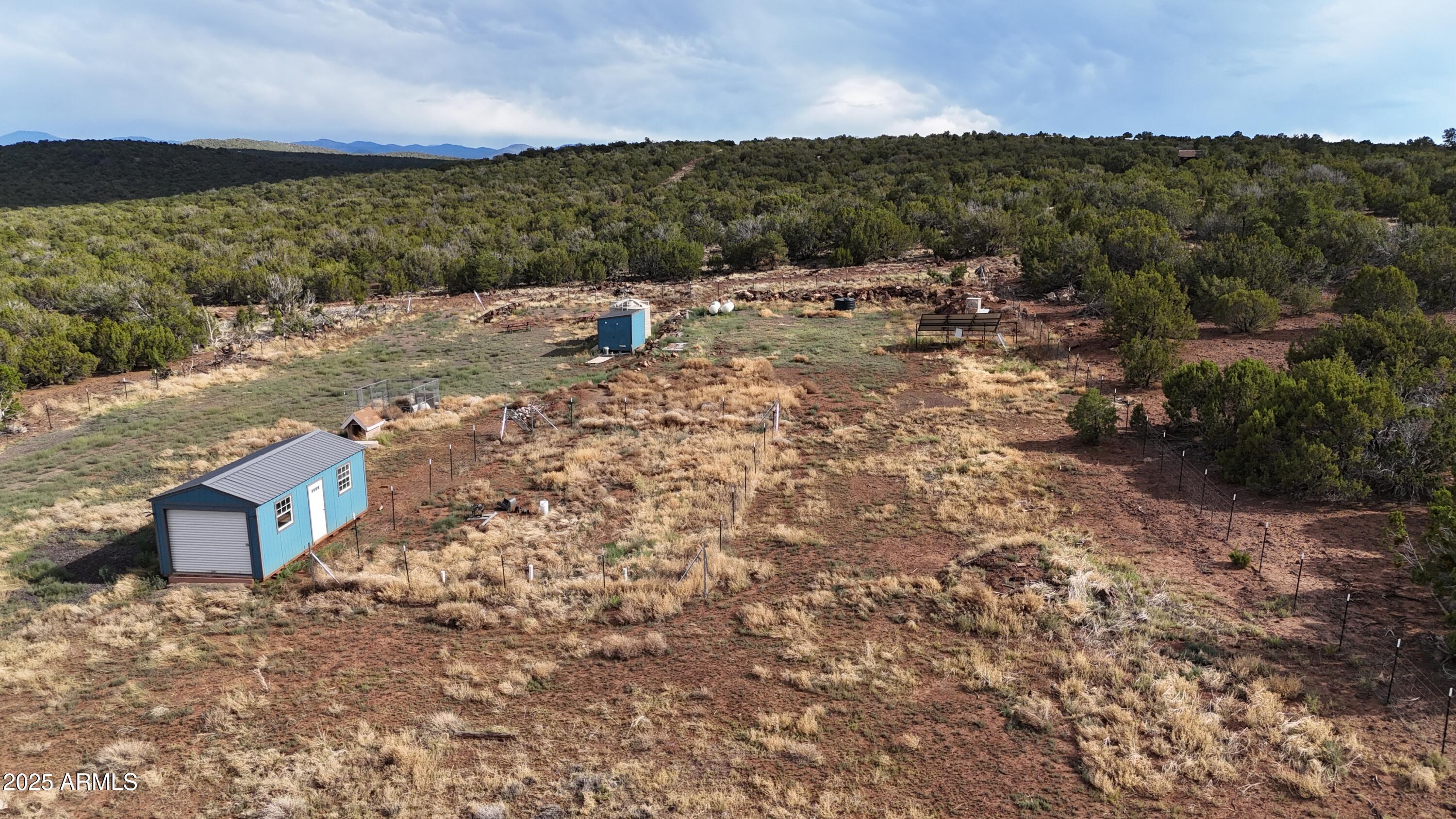71 North 8225th, Unit 202 Show Low, AZ 85901 - Photo 3 of 13 a view of a yard with an outdoor space