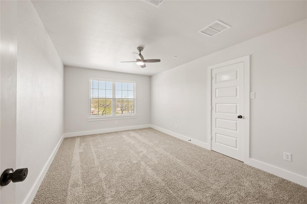 1218 Chestnut Court, Unit 2 Runaway Bay, TX 76426 - Photo 15 of 26 a view of an empty room with a window