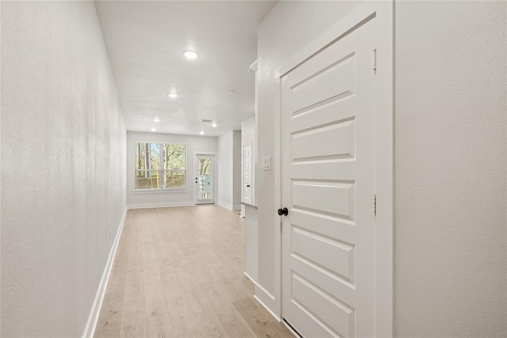 1218 Chestnut Court, Unit 2 Runaway Bay, TX 76426 - Photo 4 of 26 a view of a hallway with closet area