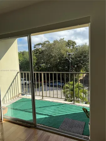 a view of a yard and porch