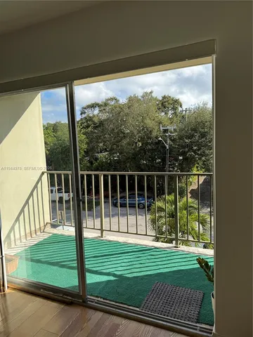 a view of a yard and porch