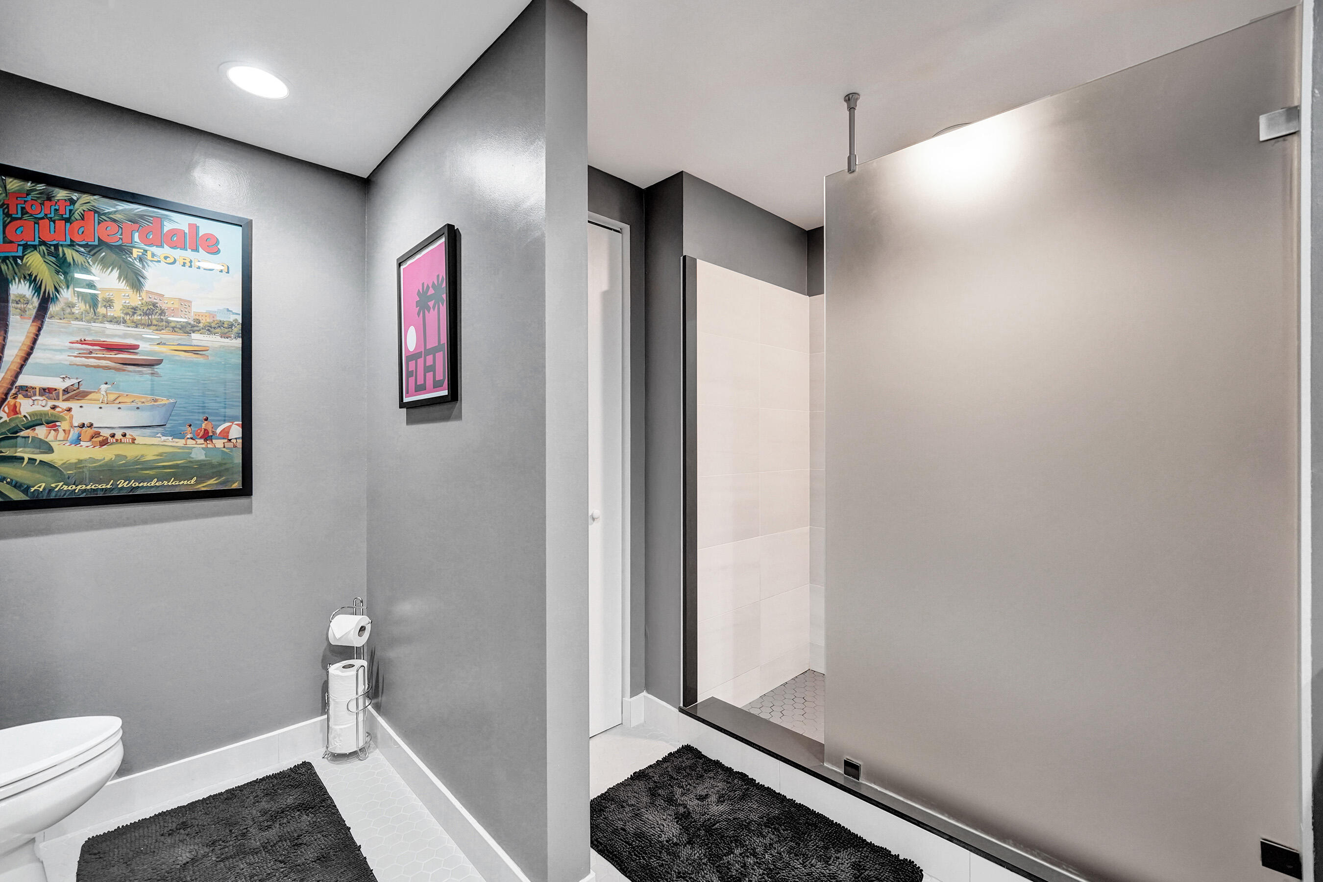 2301 Wilton Drive, Unit R309 Wilton Manors, FL 33305 - Photo 16 of 53 a bathroom with a toilet and a shower