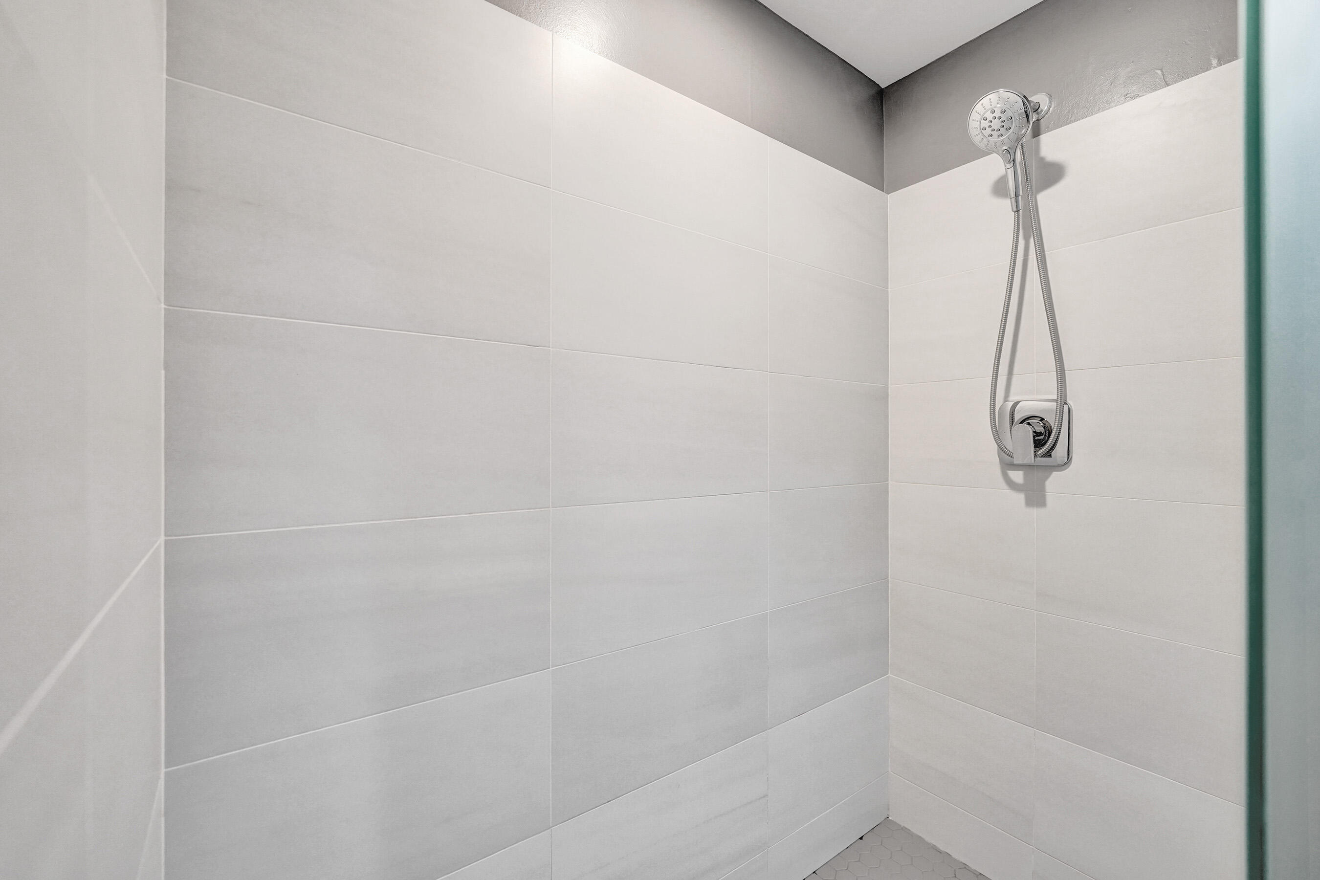 2301 Wilton Drive, Unit R309 Wilton Manors, FL 33305 - Photo 17 of 53 a bathroom with a shower
