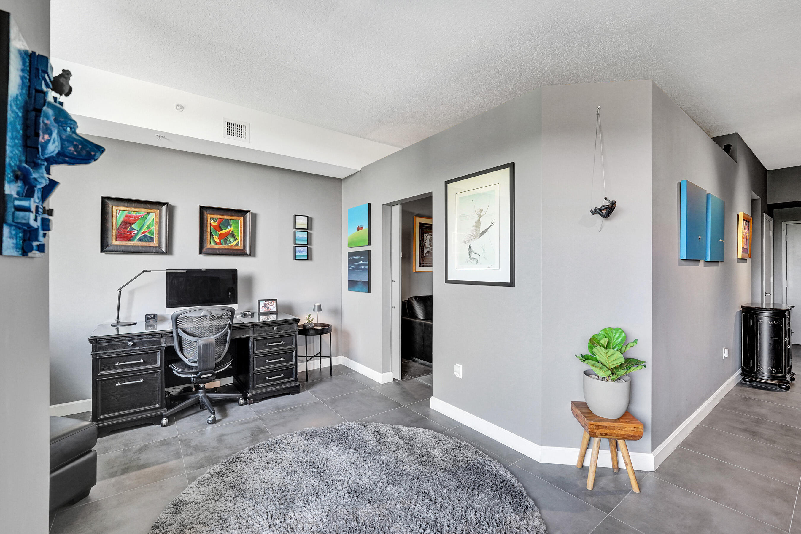 2301 Wilton Drive, Unit R309 Wilton Manors, FL 33305 - Photo 19 of 53 a workspace with furniture and a potted plant