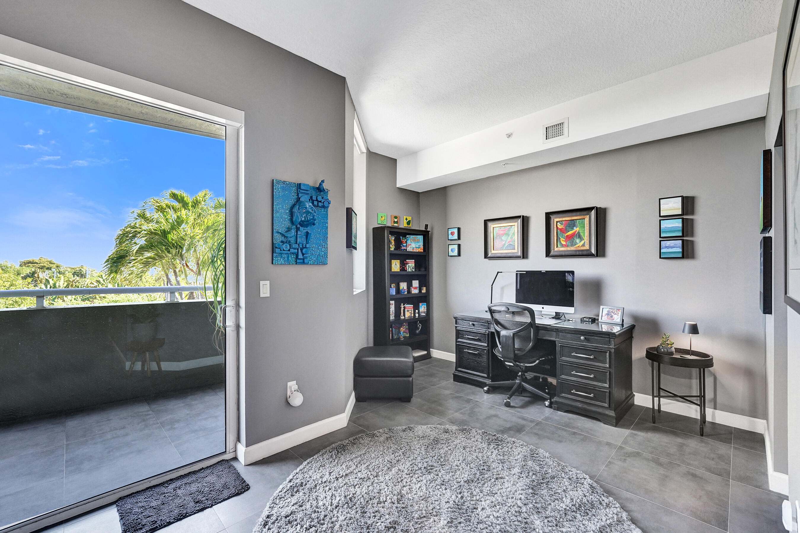 2301 Wilton Drive, Unit R309 Wilton Manors, FL 33305 - Photo 20 of 53 a view of a workspace with furniture and a window