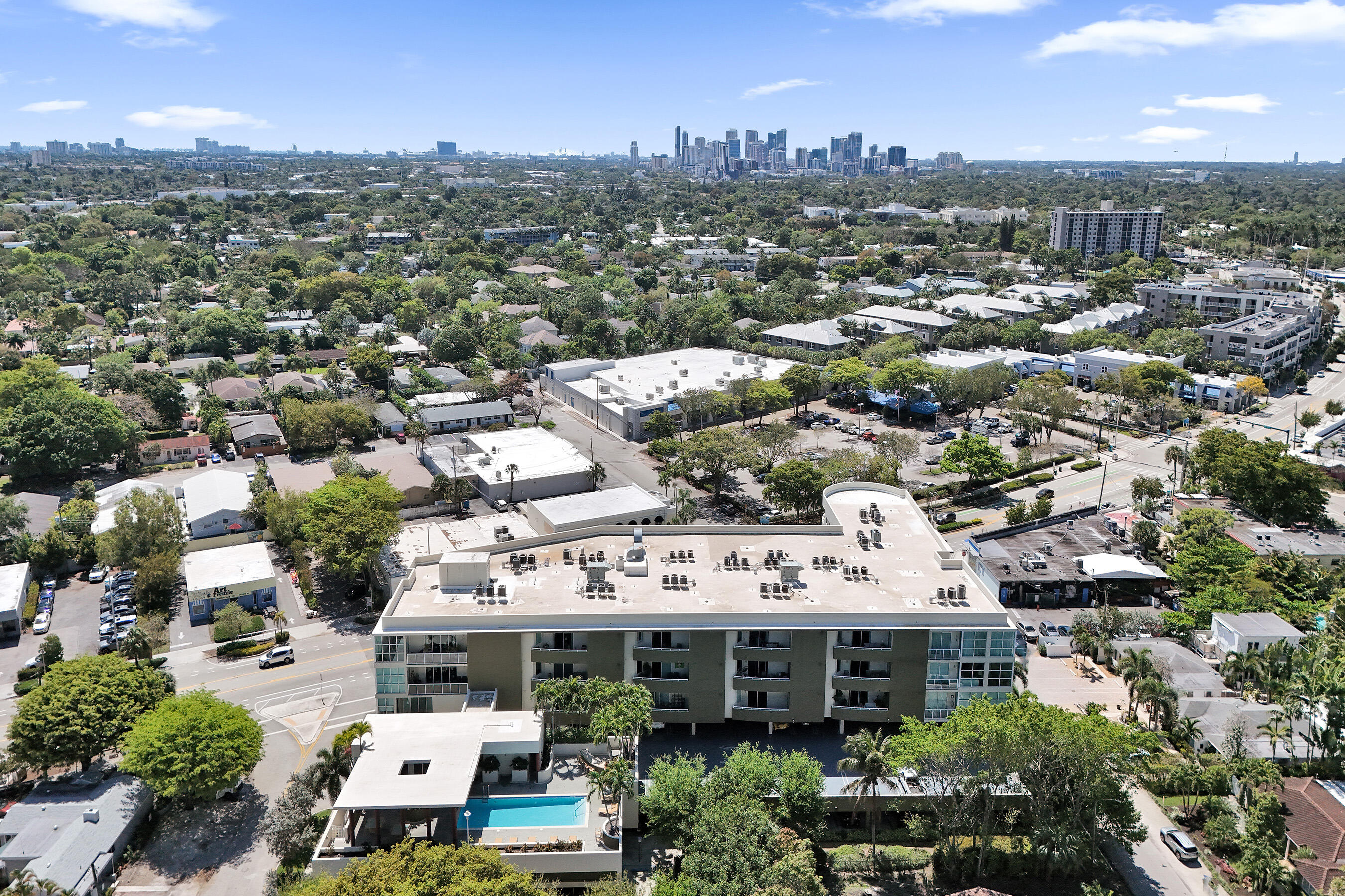 2301 Wilton Drive, Unit R309 Wilton Manors, FL 33305 - Photo 37 of 53 an aerial view of a building with parking