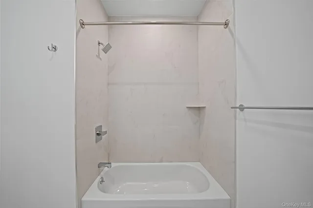 a close view of a bathtub in bathroom