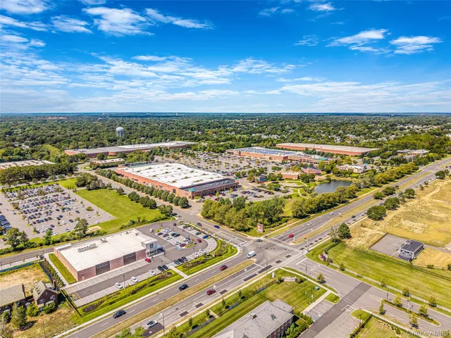 a aerial view of multiple houses with outdoor space