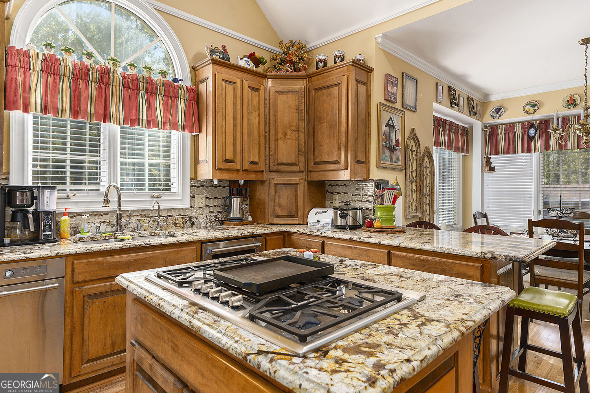 455 South Pine Hill Road Griffin, GA 30224 - Photo 13 of 27 a kitchen with stainless steel appliances granite countertop a stove a sink and a microwave