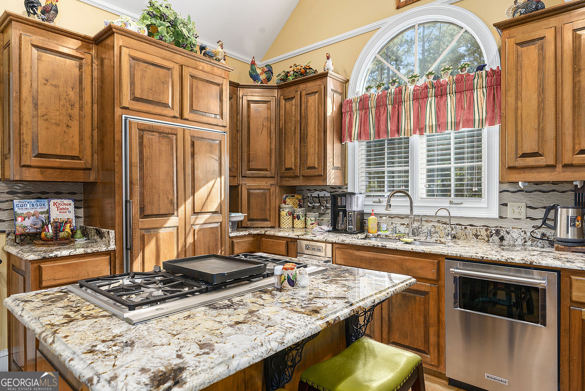 455 South Pine Hill Road Griffin, GA 30224 - Photo 14 of 27 a kitchen with stainless steel appliances granite countertop a stove a sink and a refrigerator