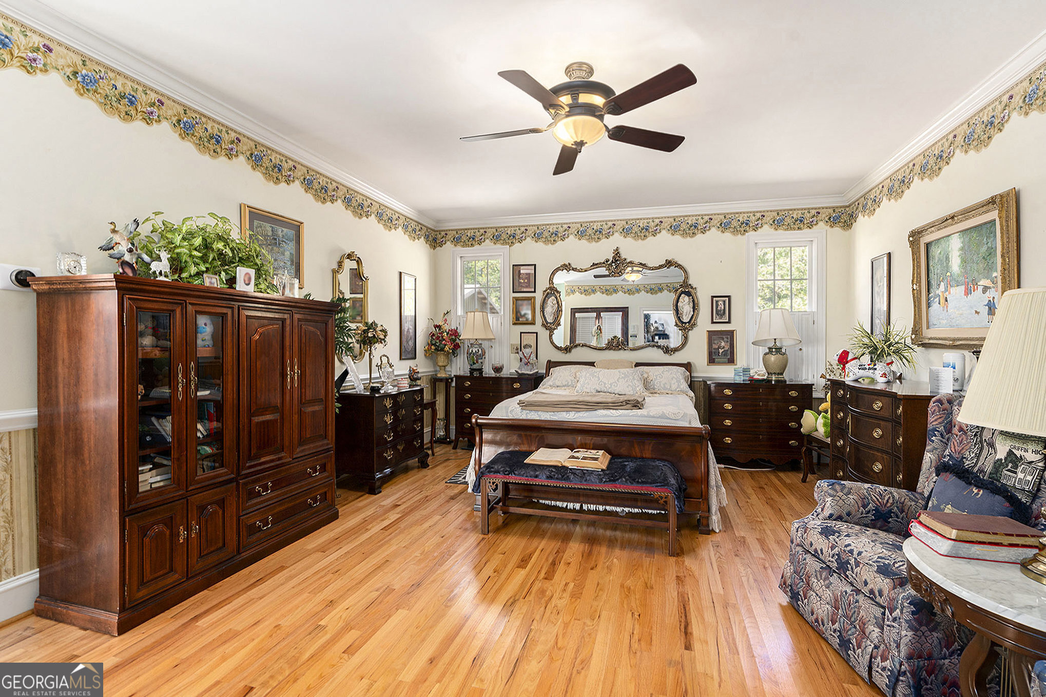 455 South Pine Hill Road Griffin, GA 30224 - Photo 17 of 27 a living room with furniture and wooden floor