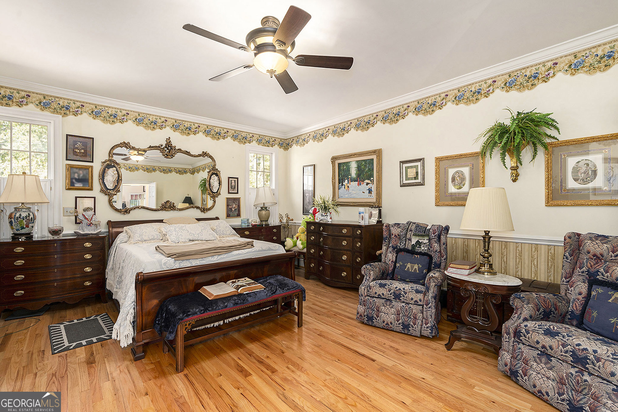 455 South Pine Hill Road Griffin, GA 30224 - Photo 18 of 27 a living room with furniture ceiling fan and a rug
