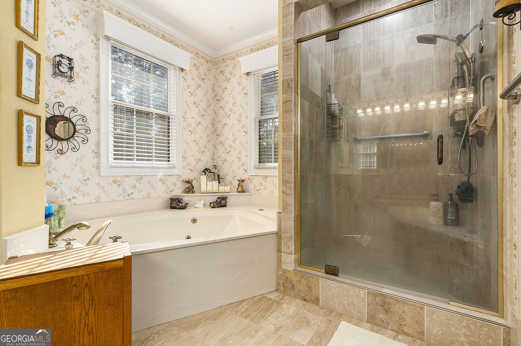 455 South Pine Hill Road Griffin, GA 30224 - Photo 20 of 27 a bathroom with a shower sink and mirror