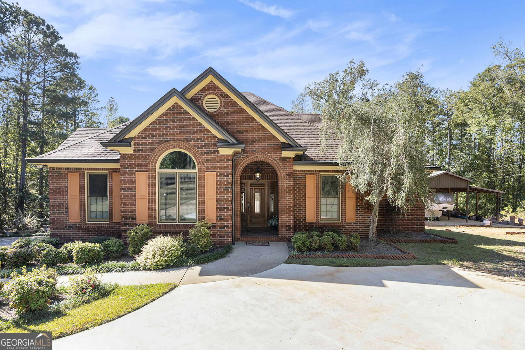 455 South Pine Hill Road Griffin, GA 30224 - Photo 2 of 27 a front view of a house with a yard