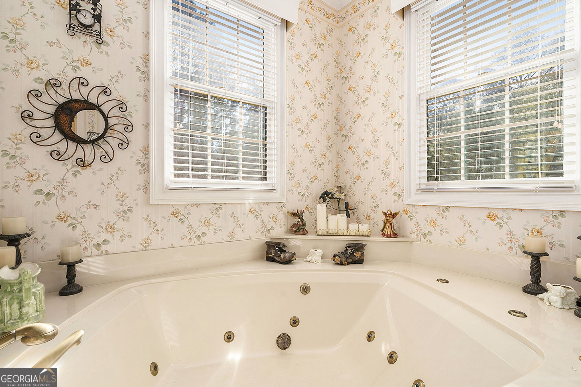 455 South Pine Hill Road Griffin, GA 30224 - Photo 21 of 27 a bath tub sitting in a bathroom next to a window