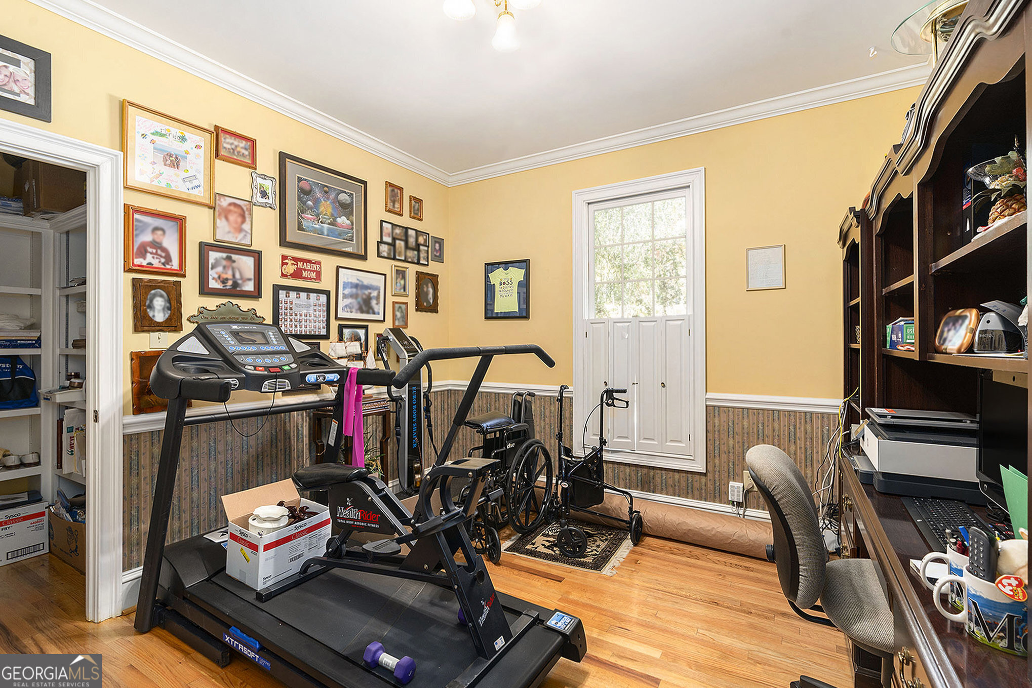 455 South Pine Hill Road Griffin, GA 30224 - Photo 22 of 27 a view of a livingroom with furniture and a workspace