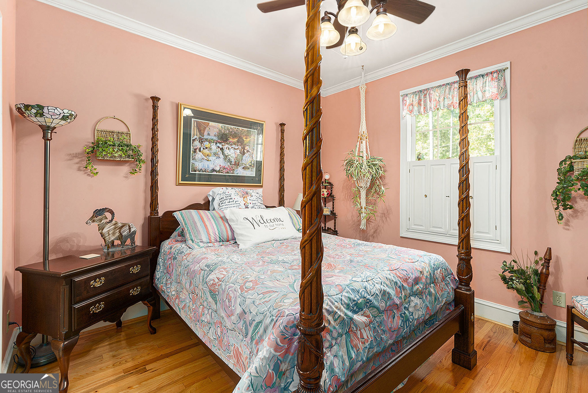 455 South Pine Hill Road Griffin, GA 30224 - Photo 23 of 27 a bed sitting in a bedroom next to a window