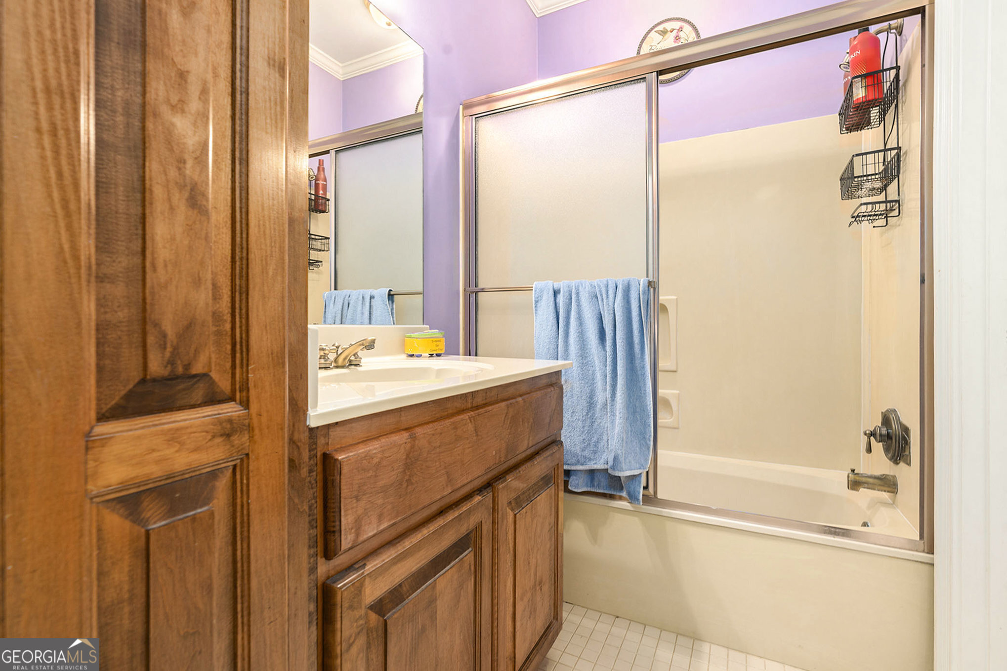 455 South Pine Hill Road Griffin, GA 30224 - Photo 24 of 27 a bathroom with a tub sink and shower