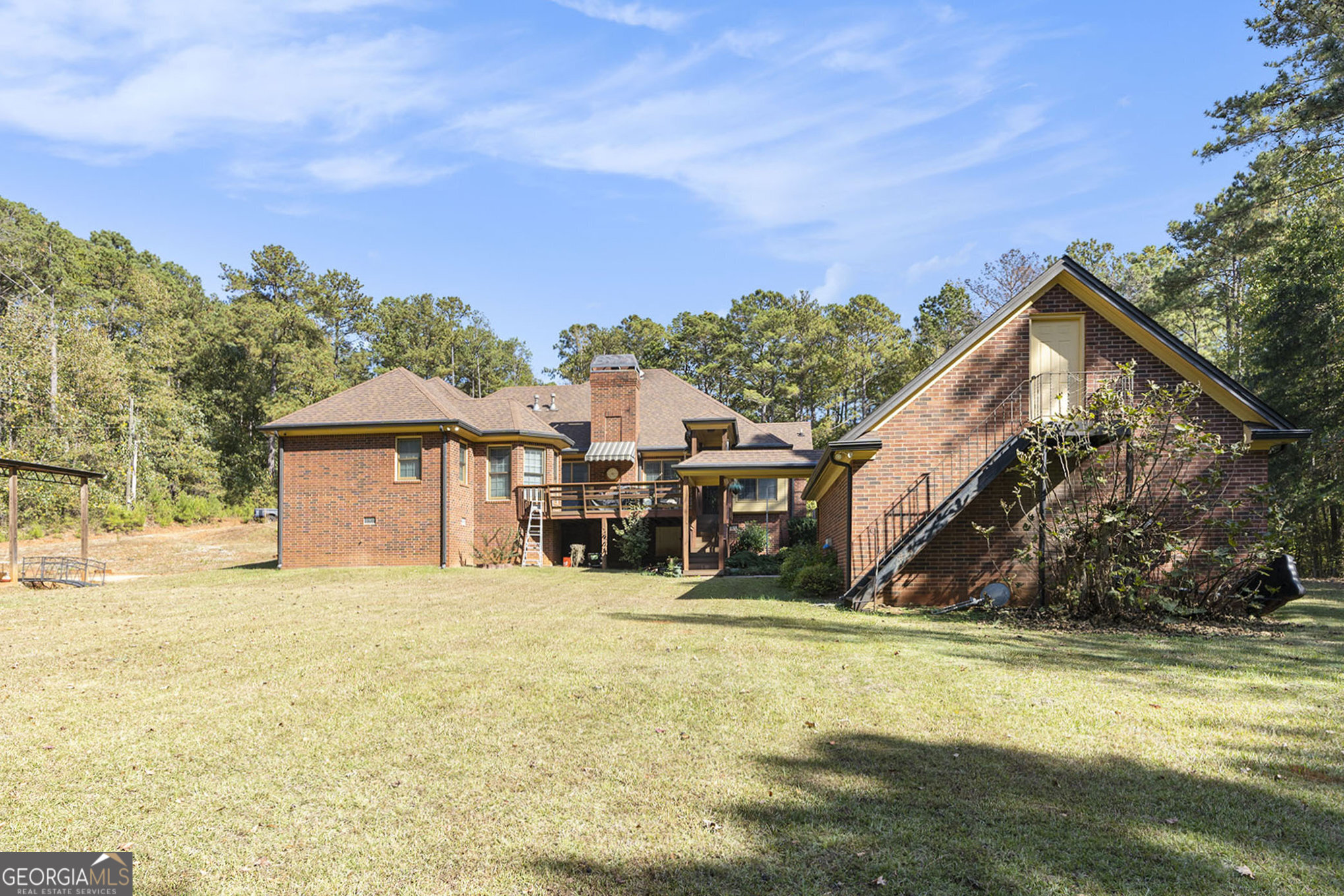 455 South Pine Hill Road Griffin, GA 30224 - Photo 25 of 27 a view of a house with a yard