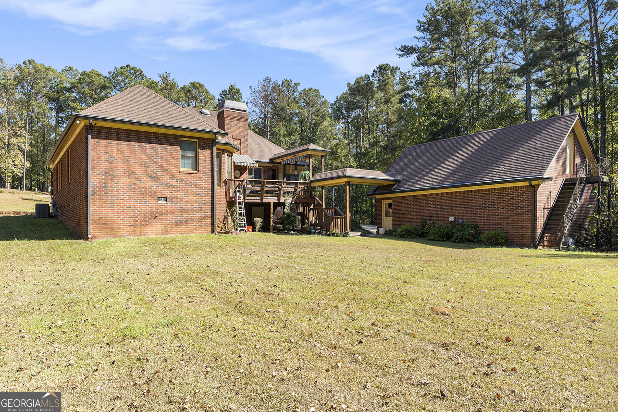 455 South Pine Hill Road Griffin, GA 30224 - Photo 26 of 27 a front view of a house with a yard