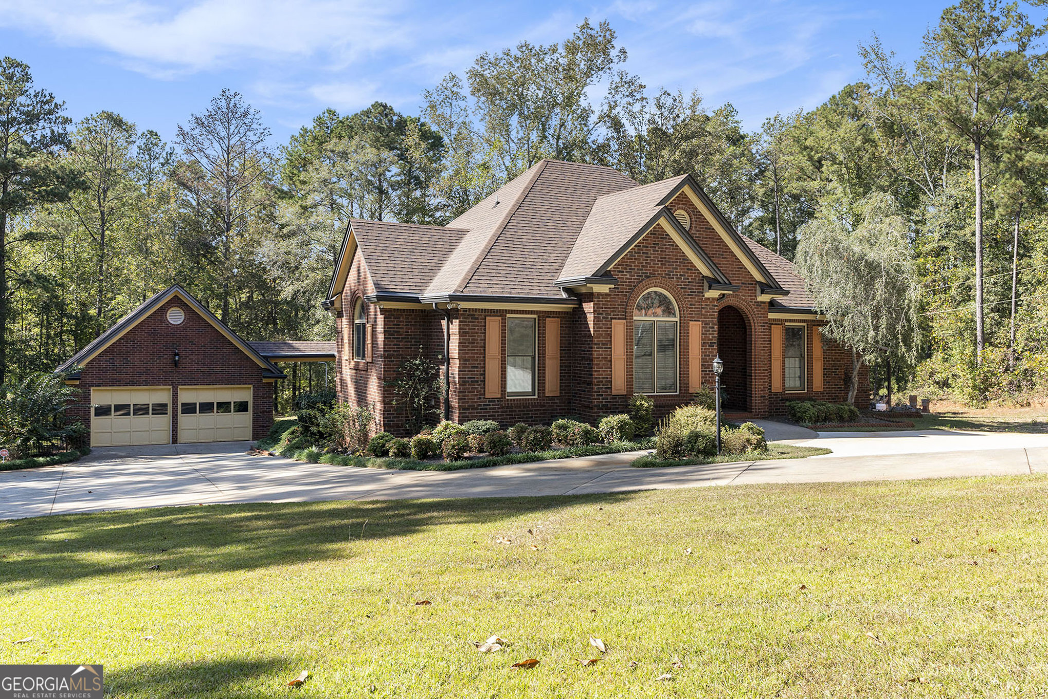 455 South Pine Hill Road Griffin, GA 30224 - Photo 3 of 27 a front view of a house with a yard