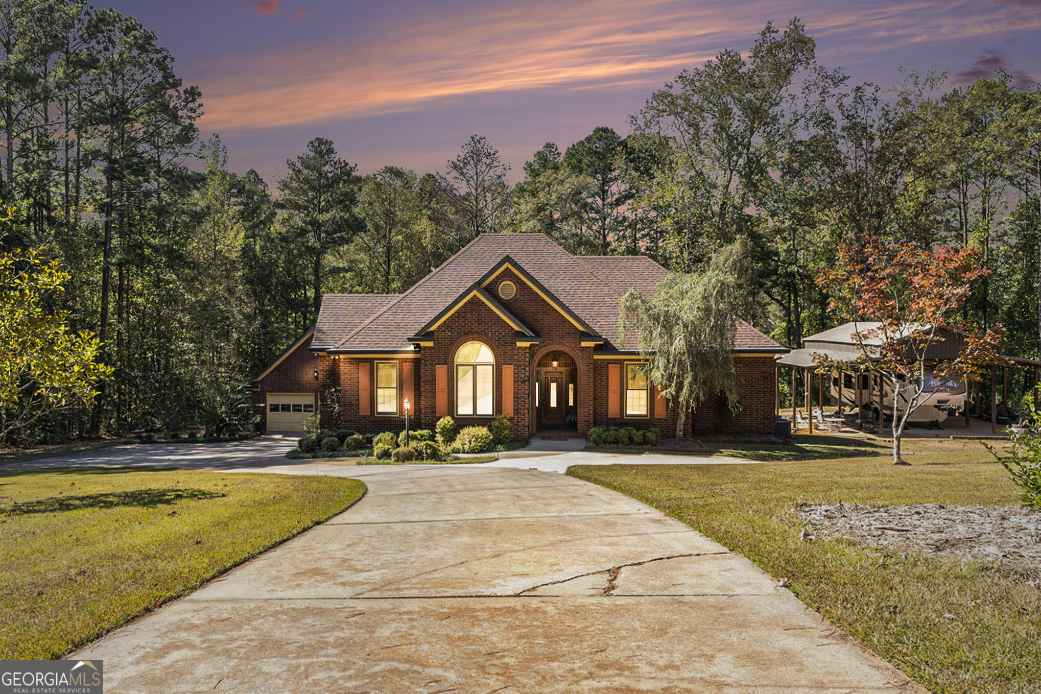 455 South Pine Hill Road Griffin, GA 30224 - Photo 5 of 27 a front view of a house with a yard