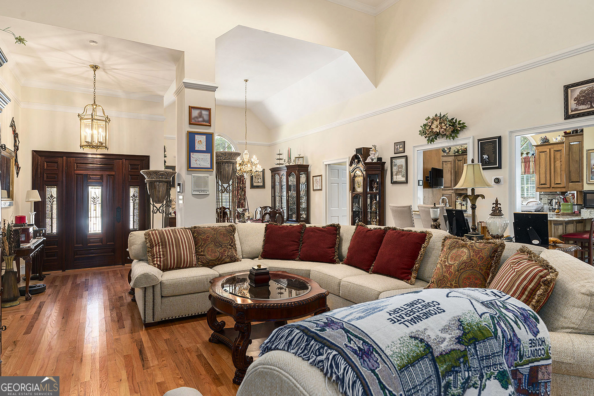 455 South Pine Hill Road Griffin, GA 30224 - Photo 9 of 27 a large living room with furniture and wooden floor