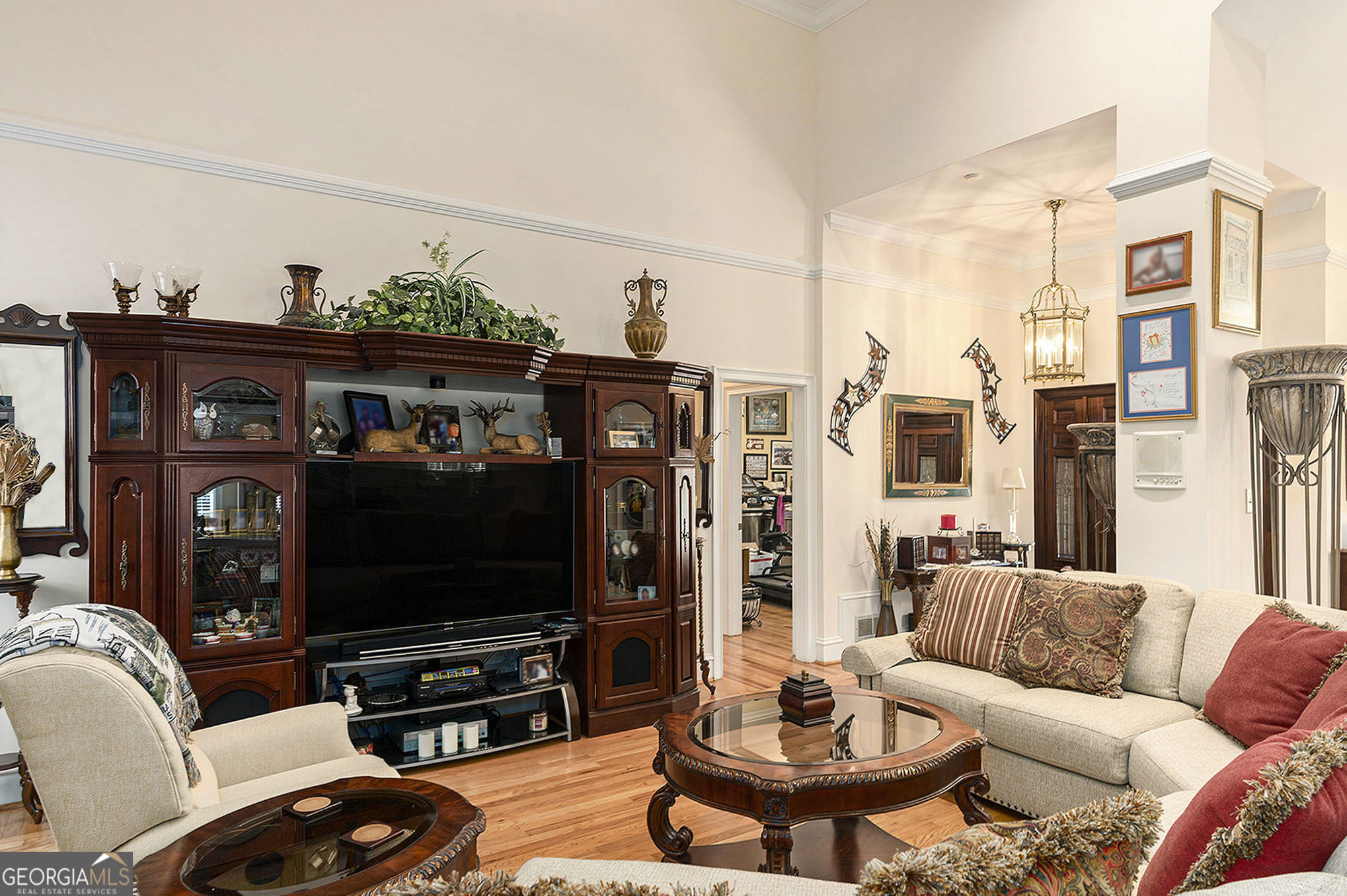 455 South Pine Hill Road Griffin, GA 30224 - Photo 10 of 27 a living room with furniture and a flat screen tv