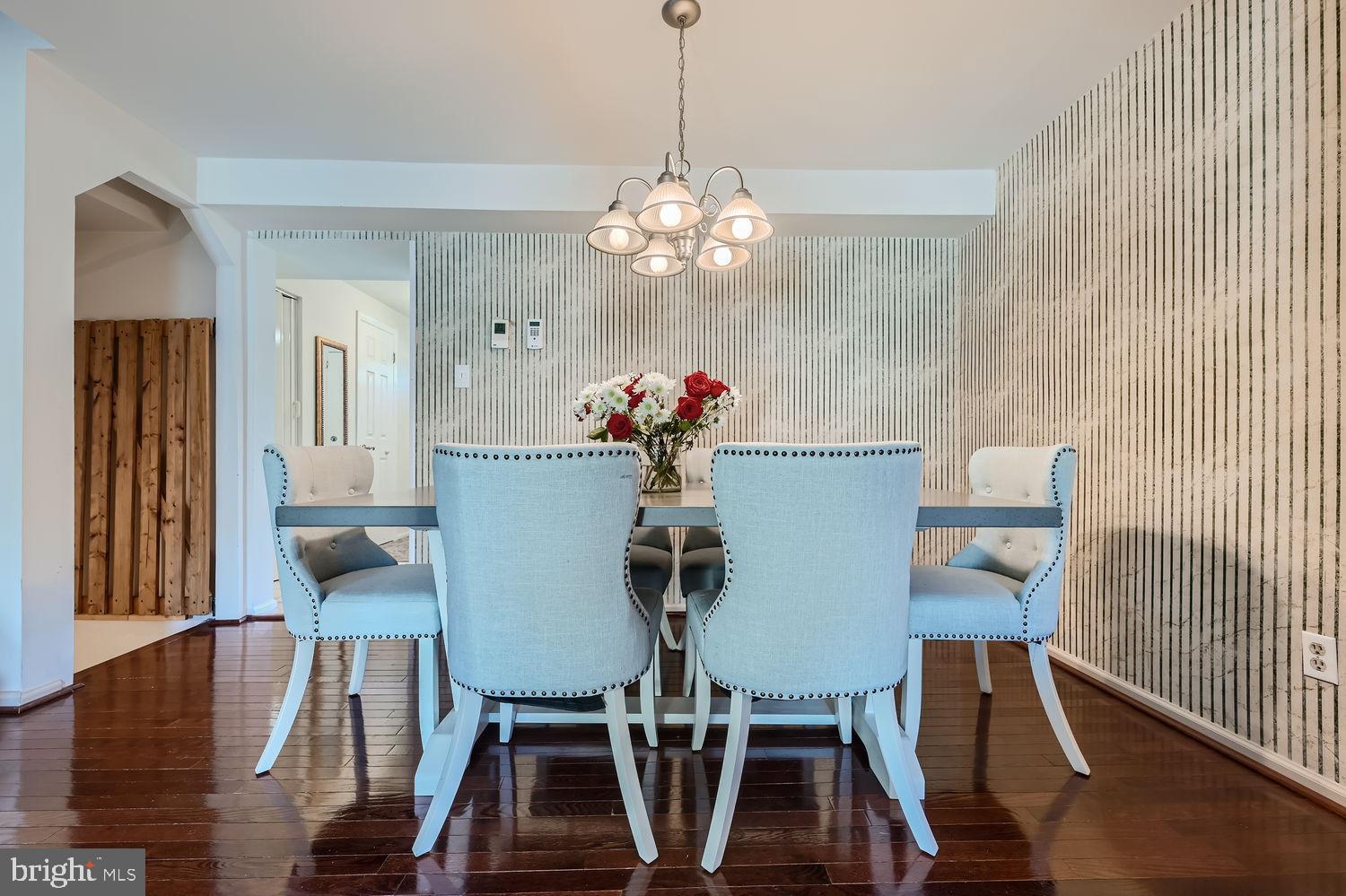 5435 King Arthur Circle Rosedale, MD 21237 - Photo 12 of 28 Elegant dining space with modern accents.