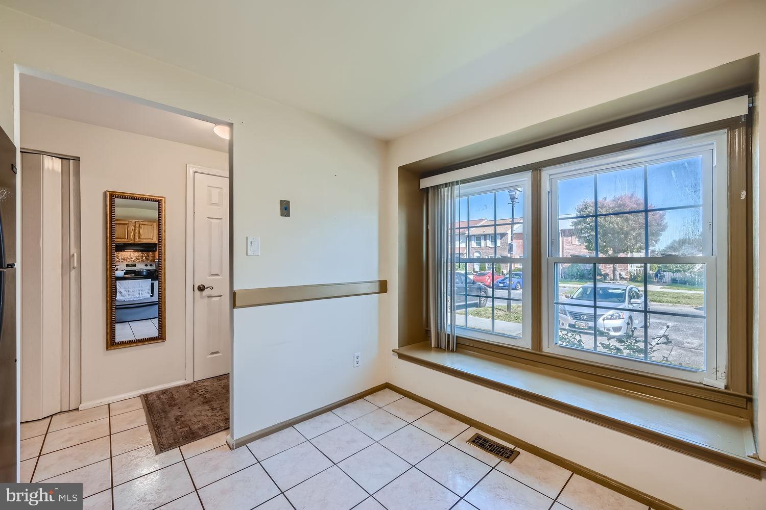 5435 King Arthur Circle Rosedale, MD 21237 - Photo 15 of 28 Bright and inviting corner with large windows.