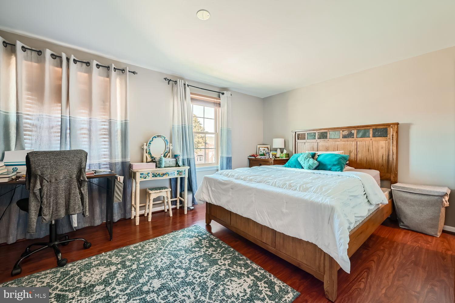 5435 King Arthur Circle Rosedale, MD 21237 - Photo 18 of 28 Serene bedroom with natural light and warmth.