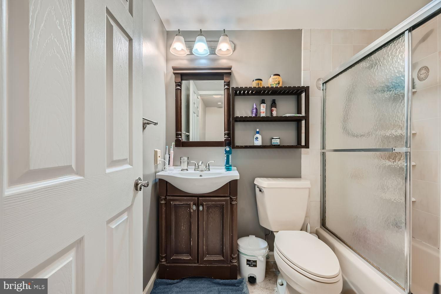 5435 King Arthur Circle Rosedale, MD 21237 - Photo 20 of 28 Charming bathroom with modern fixtures.
